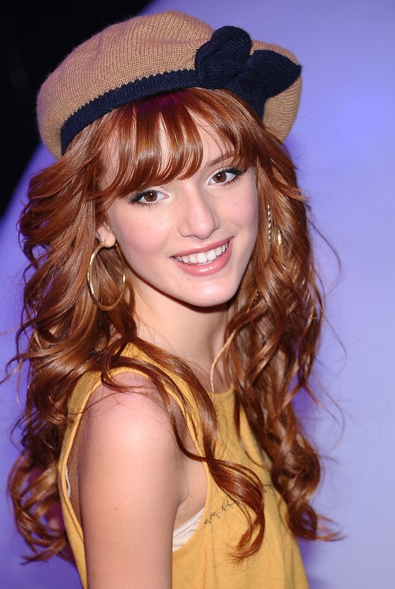 Bella Thorne Tousled Red Curly Hairstyle with Wispy Bangs for Girls