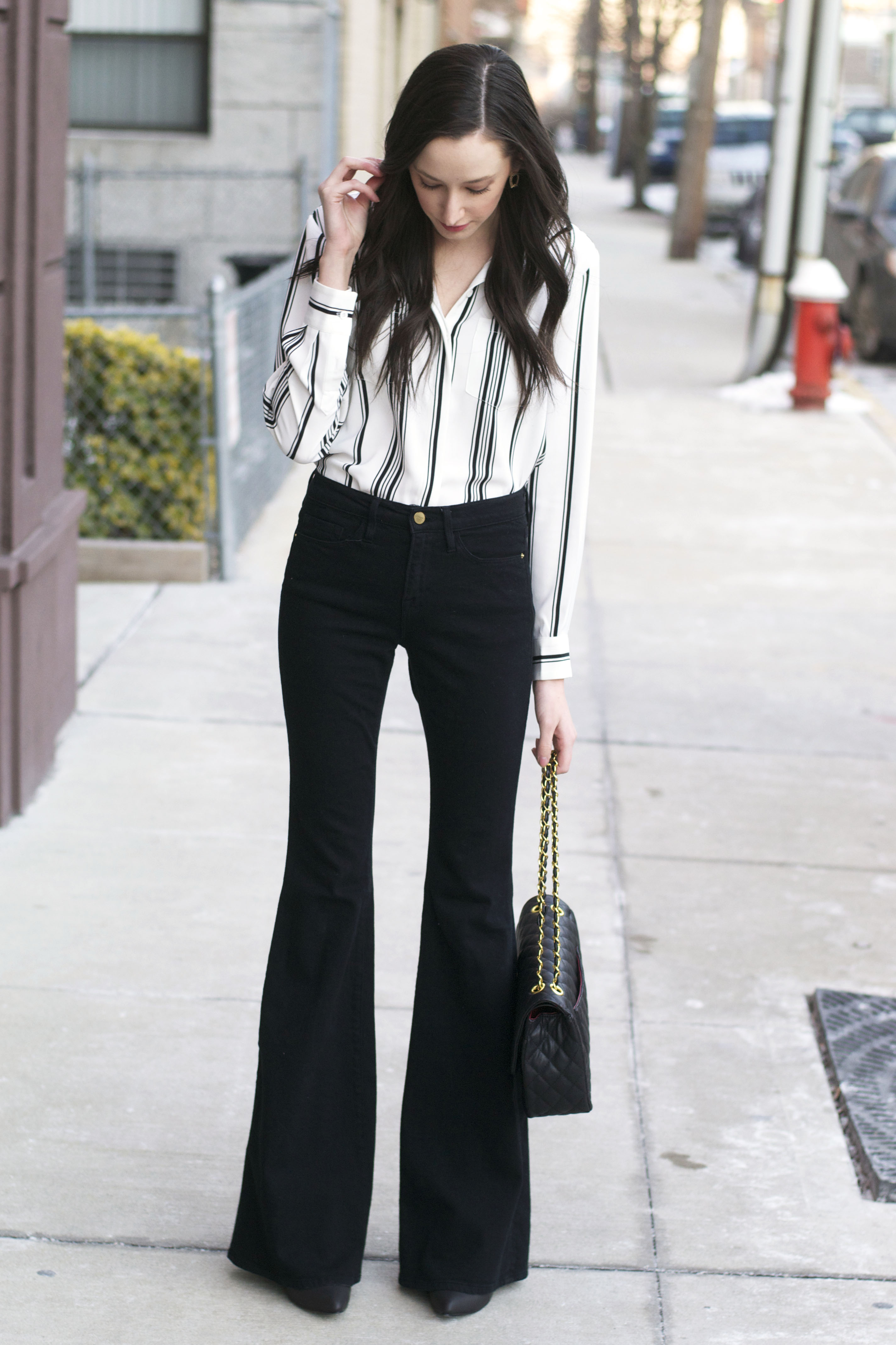 outfits with black flare pants