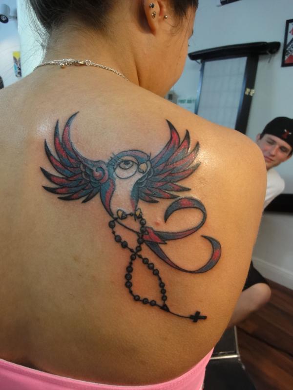 Cool redo bird tattoo