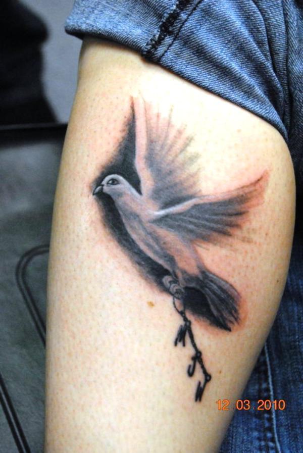 Dove tattoo on leg