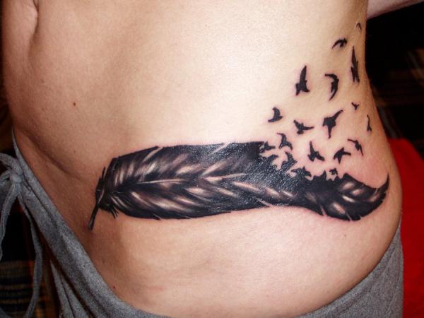 Feather and birds tattoo