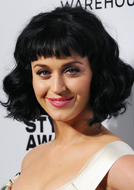 Katy Perry Short Black Wavy Hairstyle with Blunt Bangs for Women