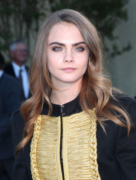 Cara Delevingne Side-parted Long Wavy Hairstyle