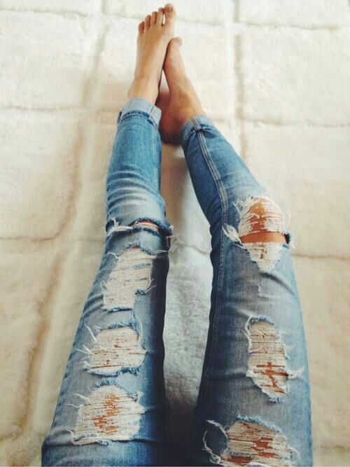 A pair of distressed jeans