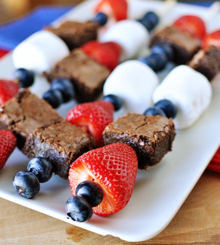 Offer some fruit, marshmallow and brownie kabobs