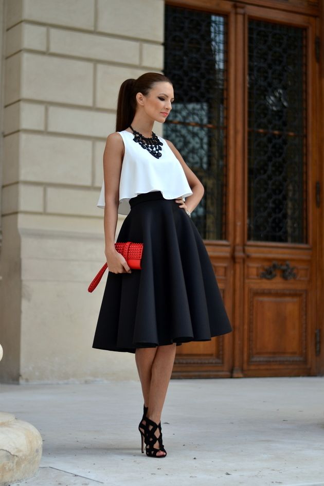 White top with a black flare skirt