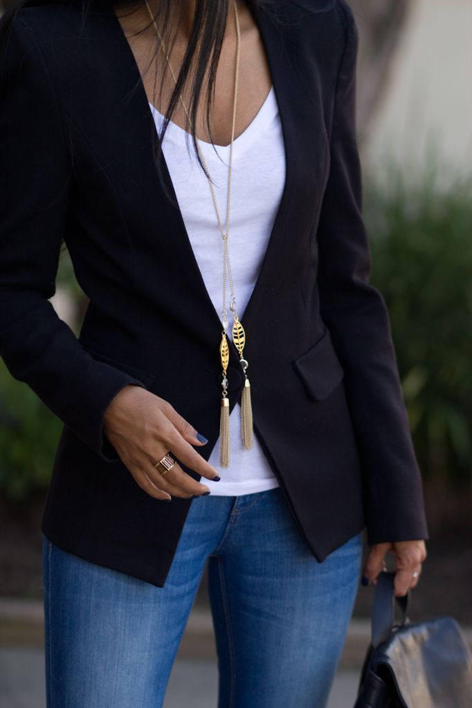 White v-neck tee and black blazer