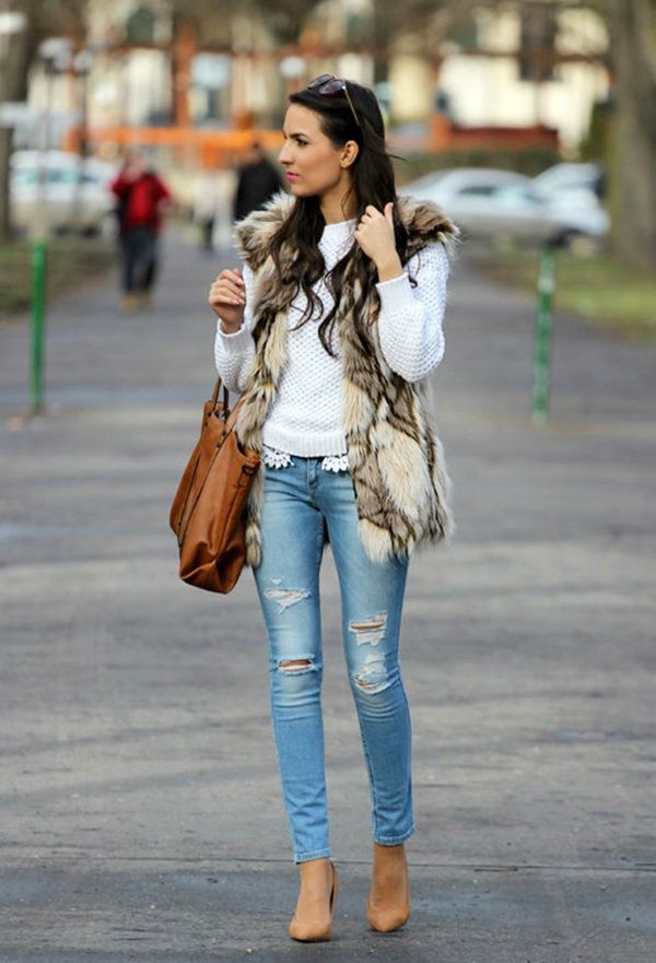 Ripped jeans and fur vest