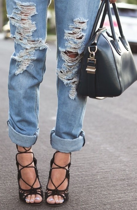 Ripped jeans and lace up heels