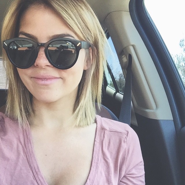 blonde blunt bob hairstyle with glasses