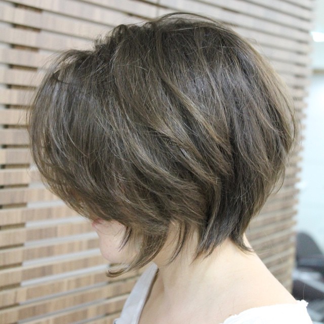 side view of cute layered messy bob haircut