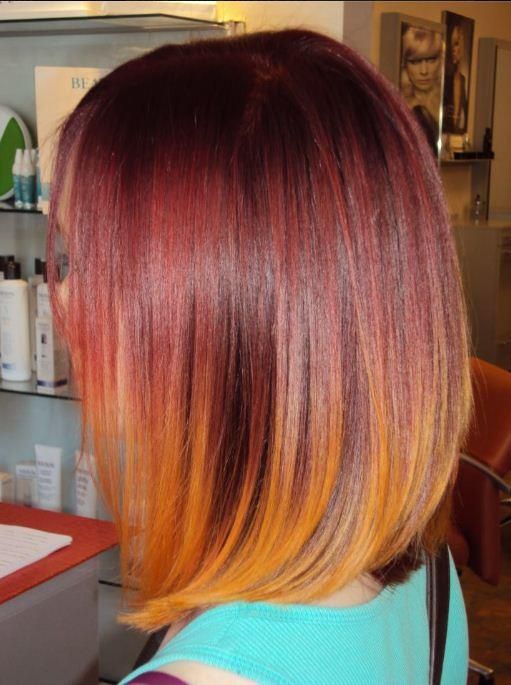 red to orange lob hairstyle for medium straight hair